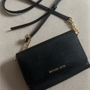 Michael Kors Black and Gold Crossbody Bag with Sleek Design